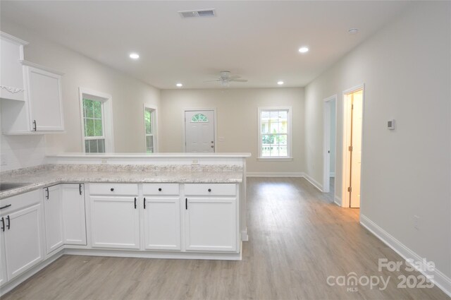 533 Third St Unit 27, Chester, SC 29706 - kitchen featuring a peninsula, light wood finished floors, white cabinetry, ceiling fan, and recessed lighting