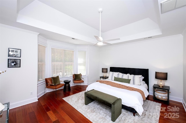 7554 Bluestar Ln, Charlotte, NC 28226 - bedroom with a tray ceiling, wood finished floors, ceiling fan, and crown molding