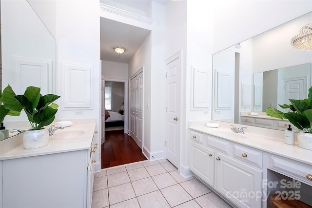 7554 Bluestar Ln, Charlotte, NC 28226 - ensuite bathroom featuring two vanities and tile patterned flooring