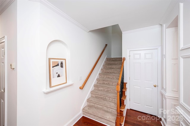 7554 Bluestar Ln, Charlotte, NC 28226 - stairway with crown molding and wood finished floors