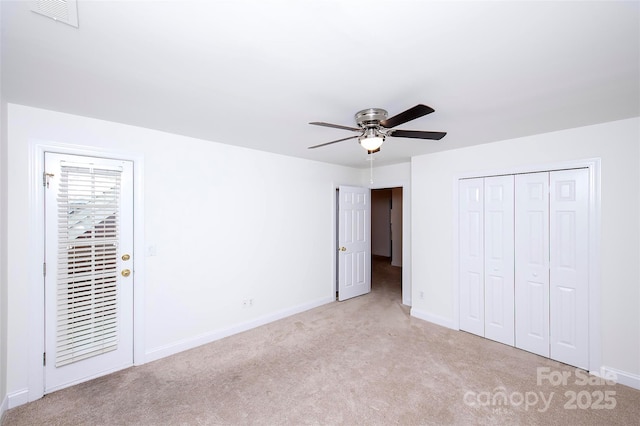 7554 Bluestar Ln, Charlotte, NC 28226 - unfurnished bedroom with carpet floors, a closet, and a ceiling fan