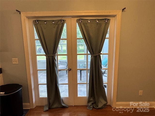 13221 Brandywine Ln, Midland, NC 28107 - doorway to outside with wood finished floors, healthy amount of natural light, and french doors