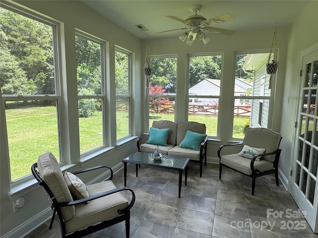 13221 Brandywine Ln, Midland, NC 28107 - sunroom / solarium featuring a ceiling fan and an outdoor hangout area