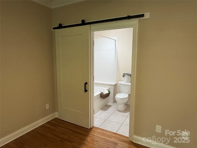 13221 Brandywine Ln, Midland, NC 28107 - bathroom with wood finished floors and crown molding