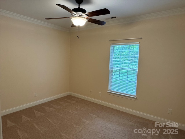 13221 Brandywine Ln, Midland, NC 28107 - carpeted spare room with ornamental molding and ceiling fan