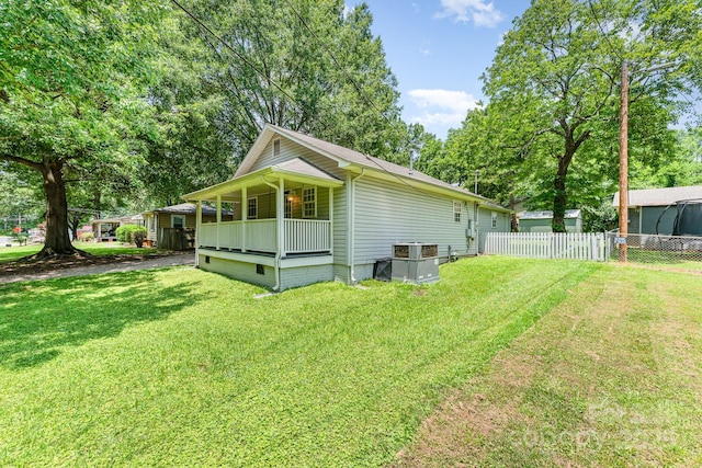 909 Lakeview St, Kannapolis, NC 28083 - view of property exterior featuring a central AC unit and covered porch