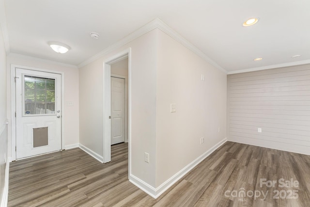 909 Lakeview St, Kannapolis, NC 28083 - spare room featuring wood finished floors, a smoke detector, ornamental molding, and recessed lighting