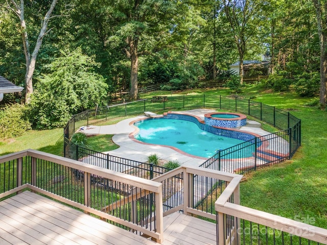 1134 Willow Oaks Trl, Matthews, NC 28104 - view of swimming pool with a wooden deck, a fenced backyard, a patio, and a pool with connected hot tub