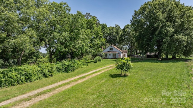 5560 Springs Rd, Conover, NC 28613 - view of green lawn featuring driveway