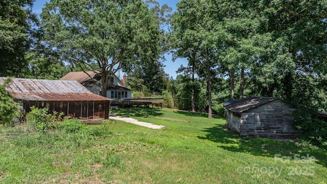 5560 Springs Rd, Conover, NC 28613 - view of grassy yard featuring an outbuilding