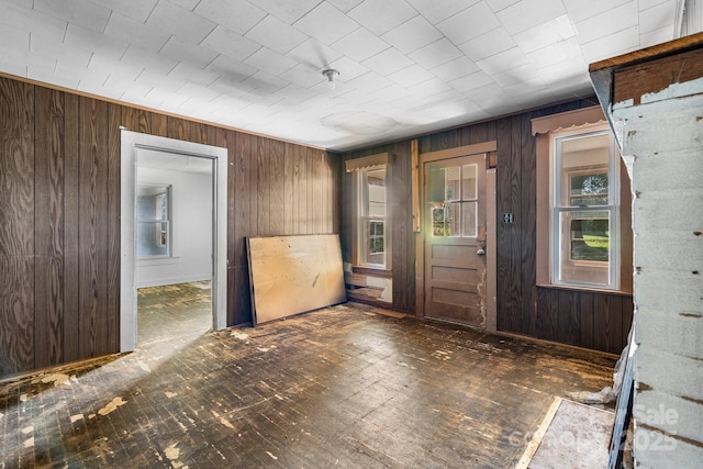 5560 Springs Rd, Conover, NC 28613 - spare room with wood walls and fire sprinkler in ceiling