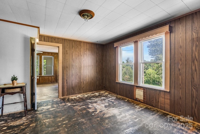 5560 Springs Rd, Conover, NC 28613 - empty room featuring healthy amount of natural light, wooden walls, and wood finished floors