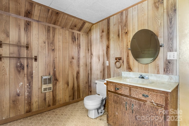 5560 Springs Rd, Conover, NC 28613 - half bathroom with heating unit, wooden walls, and vanity