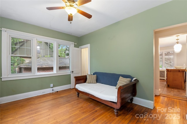30 Caledonia Rd, Asheville, NC 28803 - sitting room featuring hardwood / wood-style flooring, plenty of natural light, and ceiling fan