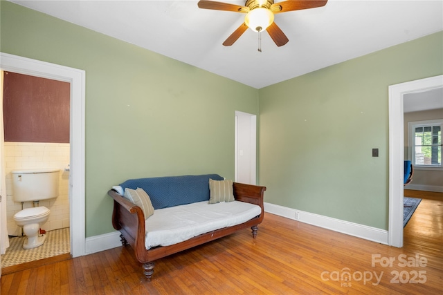 30 Caledonia Rd, Asheville, NC 28803 - living area featuring hardwood / wood-style flooring, a ceiling fan, and tile walls