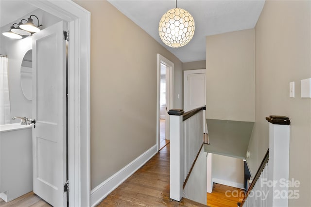 30 Caledonia Rd, Asheville, NC 28803 - corridor featuring an upstairs landing and wood finished floors