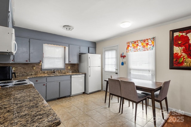 662 Willa Ct Unit 8, Chester, SC 29706 - kitchen featuring white appliances, decorative backsplash, dark countertops, gray cabinets, and ornamental molding