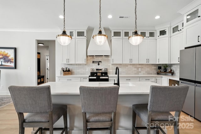 19 Berea Baptist Church Rd, Stanfield, NC 28163 - kitchen with appliances with stainless steel finishes, decorative backsplash, pendant lighting, recessed lighting, and white cabinetry