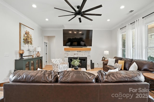 19 Berea Baptist Church Rd, Stanfield, NC 28163 - living area with ceiling fan, a fireplace, recessed lighting, wood finished floors, and crown molding