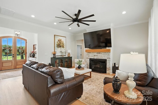 19 Berea Baptist Church Rd, Stanfield, NC 28163 - living room with a ceiling fan, light wood finished floors, crown molding, recessed lighting, and a fireplace