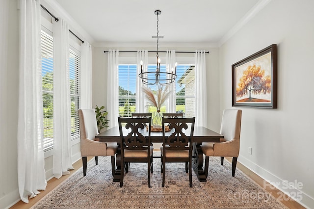 19 Berea Baptist Church Rd, Stanfield, NC 28163 - dining room with a chandelier, ornamental molding, and light wood-style floors
