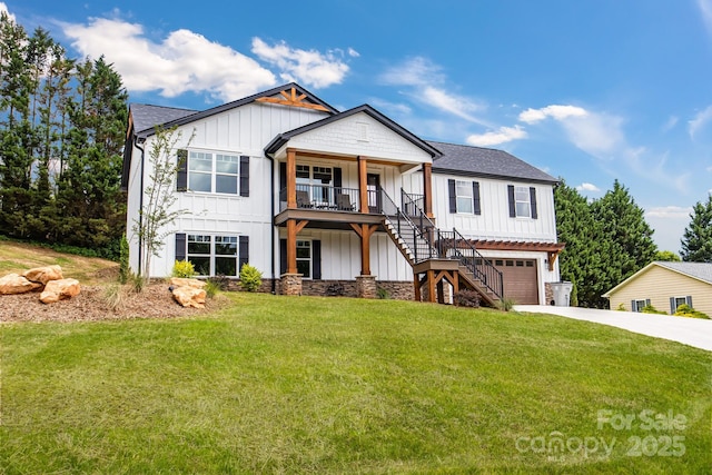 2205 Olde W Rd, Hudson, NC 28638 - modern inspired farmhouse with stairway, board and batten siding, driveway, an attached garage, and a front lawn