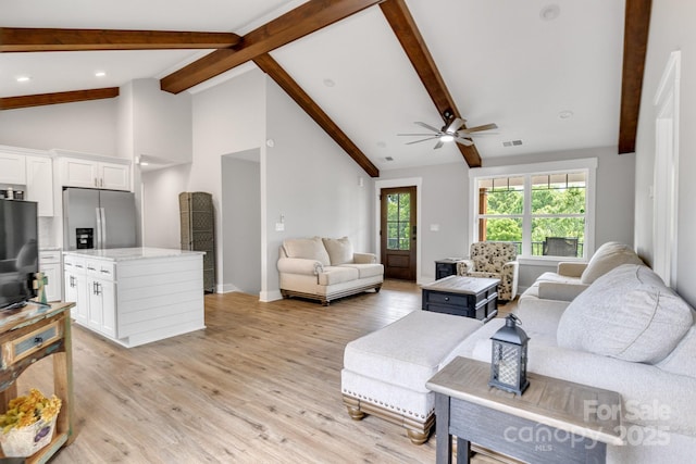 2205 Olde W Rd, Hudson, NC 28638 - living area featuring beam ceiling, ceiling fan, light wood finished floors, high vaulted ceiling, and recessed lighting