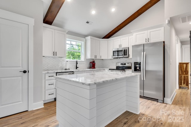 2205 Olde W Rd, Hudson, NC 28638 - kitchen with stainless steel appliances, decorative backsplash, light wood-style floors, and recessed lighting