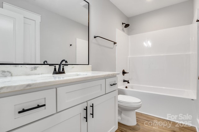 2205 Olde W Rd, Hudson, NC 28638 - bathroom with wood finished floors, vanity, and  shower combination