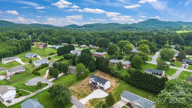 2205 Olde W Rd, Hudson, NC 28638 - aerial perspective of suburban area with a forest and mountains