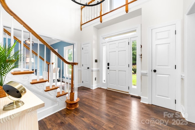 5408 Apple Glen Dr, Harrisburg, NC 28075 - foyer entrance with wood finished floors, stairs, and a high ceiling