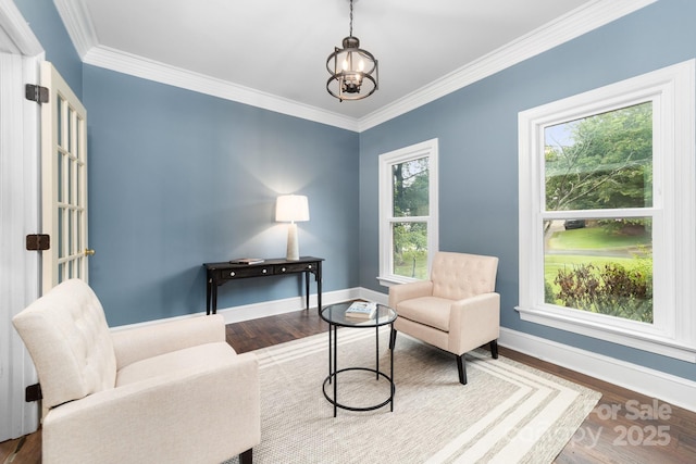 5408 Apple Glen Dr, Harrisburg, NC 28075 - living area featuring a chandelier, wood finished floors, and crown molding
