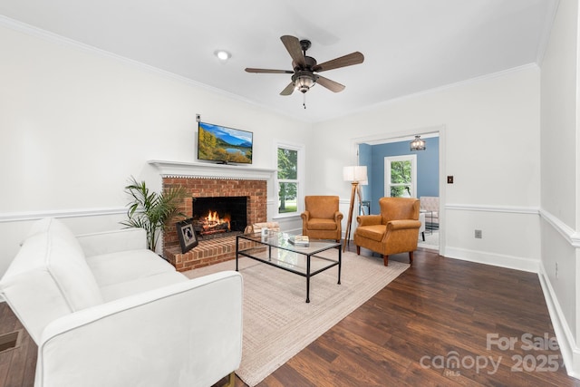 5408 Apple Glen Dr, Harrisburg, NC 28075 - living room with wood finished floors, a brick fireplace, crown molding, and ceiling fan