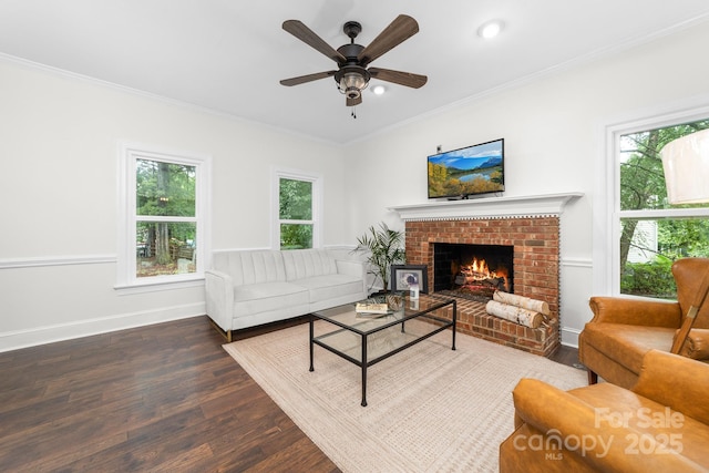 5408 Apple Glen Dr, Harrisburg, NC 28075 - living room featuring wood finished floors, crown molding, a fireplace, a ceiling fan, and recessed lighting