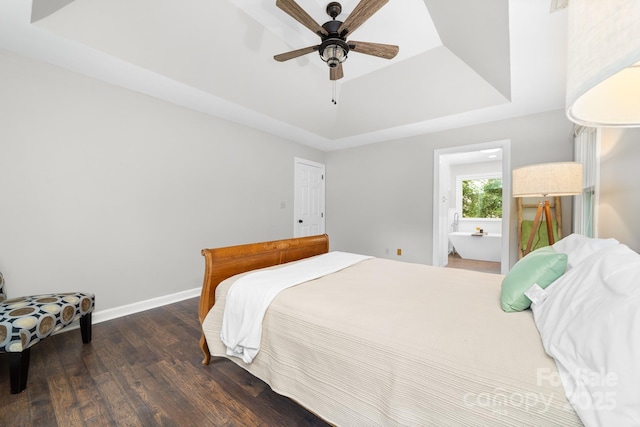 5408 Apple Glen Dr, Harrisburg, NC 28075 - bedroom featuring a raised ceiling, wood finished floors, a ceiling fan, and ensuite bath