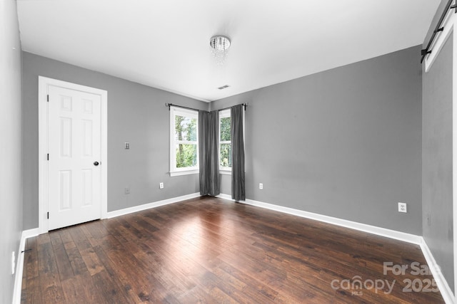 5408 Apple Glen Dr, Harrisburg, NC 28075 - empty room with hardwood / wood-style floors and baseboards