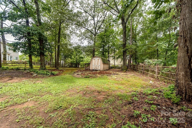 5408 Apple Glen Dr, Harrisburg, NC 28075 - fenced backyard featuring a storage shed