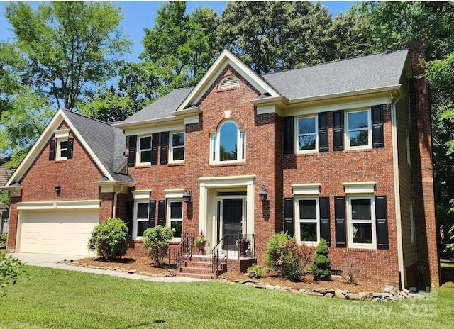 5408 Apple Glen Dr, Harrisburg, NC 28075 - colonial-style house with brick siding and a front yard