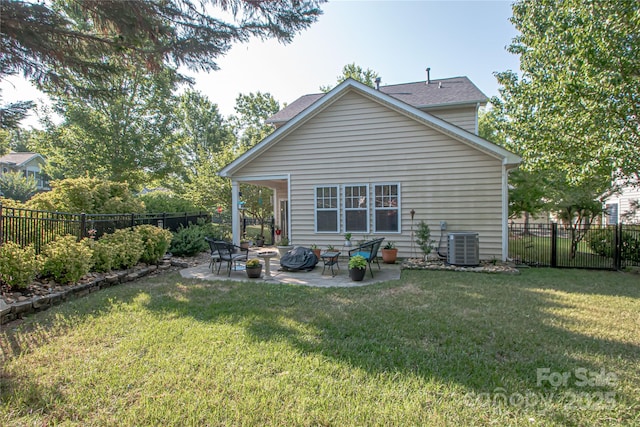 1304 Hammond Dr, Matthews, NC 28104 - rear view of house with a patio area and a fenced backyard