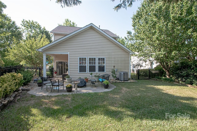1304 Hammond Dr, Matthews, NC 28104 - back of house with a fenced backyard and a patio