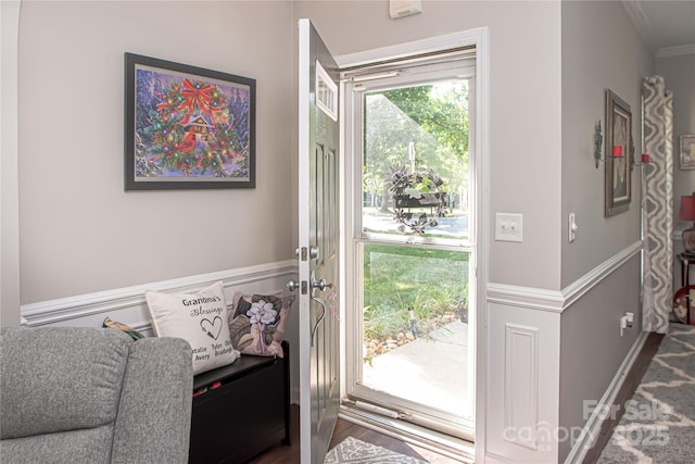 1304 Hammond Dr, Matthews, NC 28104 - doorway to outside featuring crown molding and wood finished floors