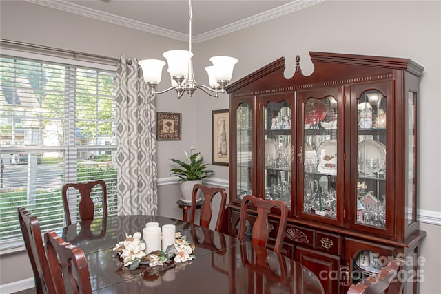 1304 Hammond Dr, Matthews, NC 28104 - dining room featuring crown molding and a chandelier