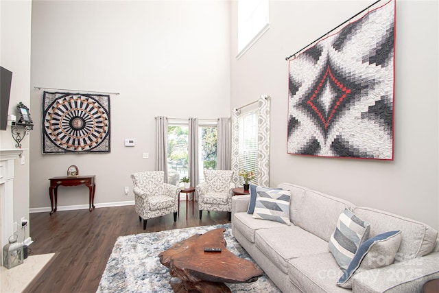 1304 Hammond Dr, Matthews, NC 28104 - living area featuring a towering ceiling and dark wood-style flooring