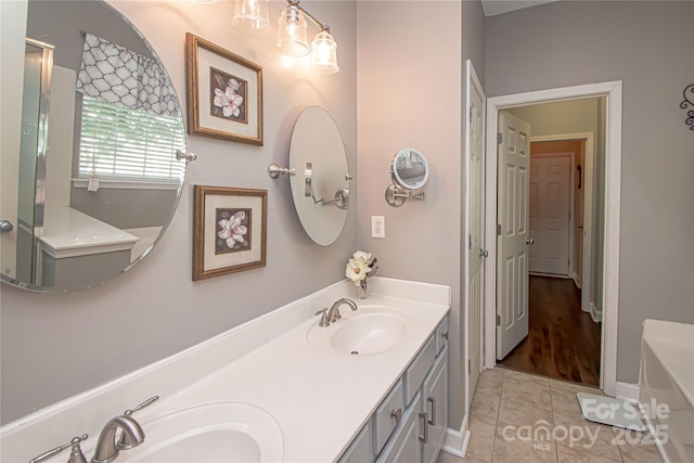 1304 Hammond Dr, Matthews, NC 28104 - full bath featuring double vanity, a bathtub, and tile patterned flooring