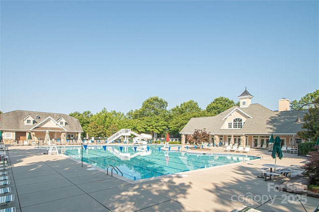 1304 Hammond Dr, Matthews, NC 28104 - community pool with a patio area