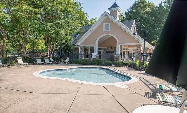 1304 Hammond Dr, Matthews, NC 28104 - community pool featuring a patio