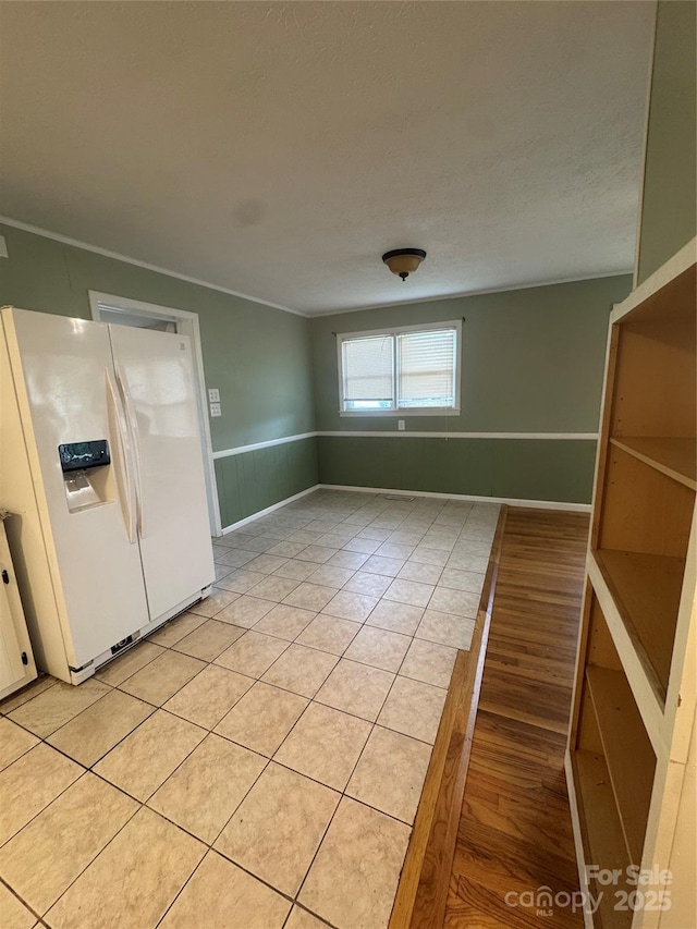 5367 Meadowlane Dr, Granite Falls, NC 28630 - unfurnished room with wainscoting and light tile patterned floors