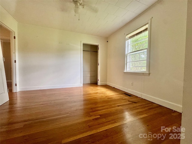 5367 Meadowlane Dr, Granite Falls, NC 28630 - unfurnished bedroom with wood finished floors and ceiling fan