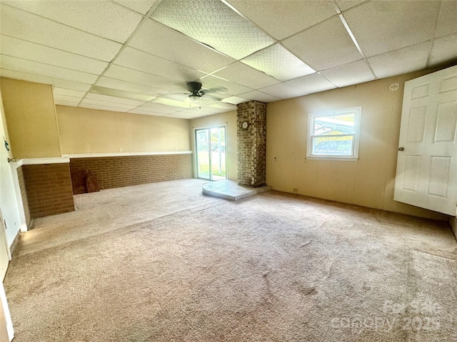 5367 Meadowlane Dr, Granite Falls, NC 28630 - spare room featuring a drop ceiling, a ceiling fan, healthy amount of natural light, and carpet floors