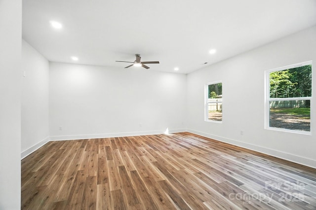 411 Patience Dr, Concord, NC 28025 - spare room with recessed lighting, a ceiling fan, and wood finished floors